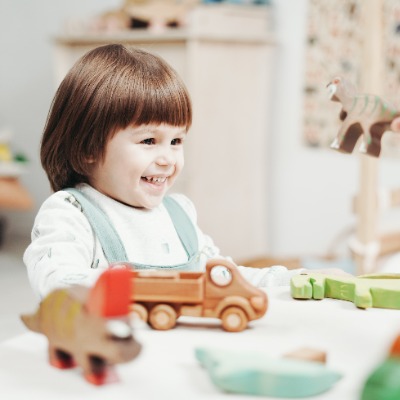 Girl playing toys